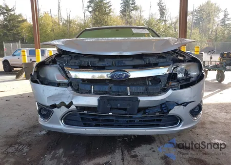 2010 Ford Fusion Hybrid z USA, uszkodzony, nr VIN 3FADP0L36AR135638